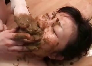 An Asian dominatrix using a chubby submissive gal