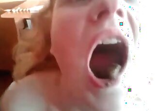 Opening her mouth wide open and showing the poop