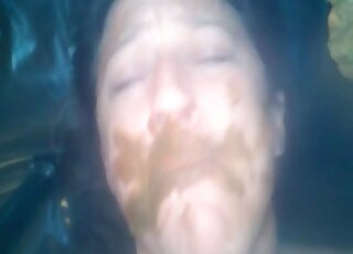 Amateur video of a horny woman eating some warm scat