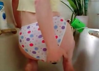 Girl playing with her pants and lots of shit